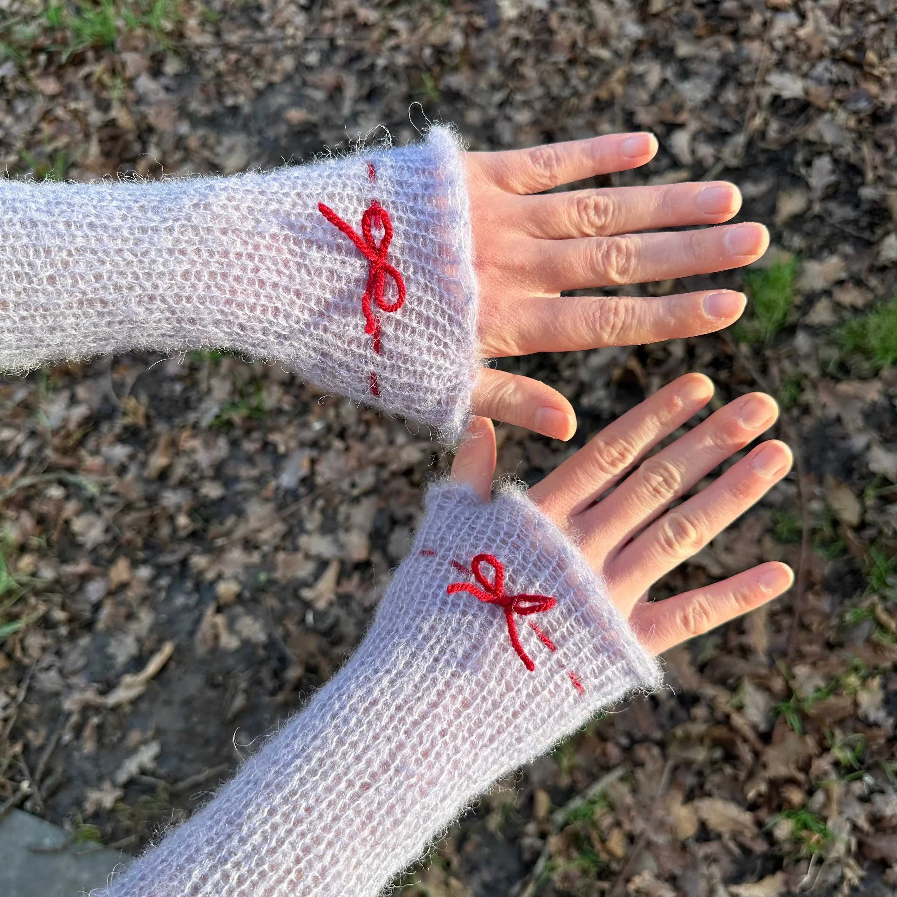 Handmade knitted mohair bow gloves in baby blue and red - with thumb hole