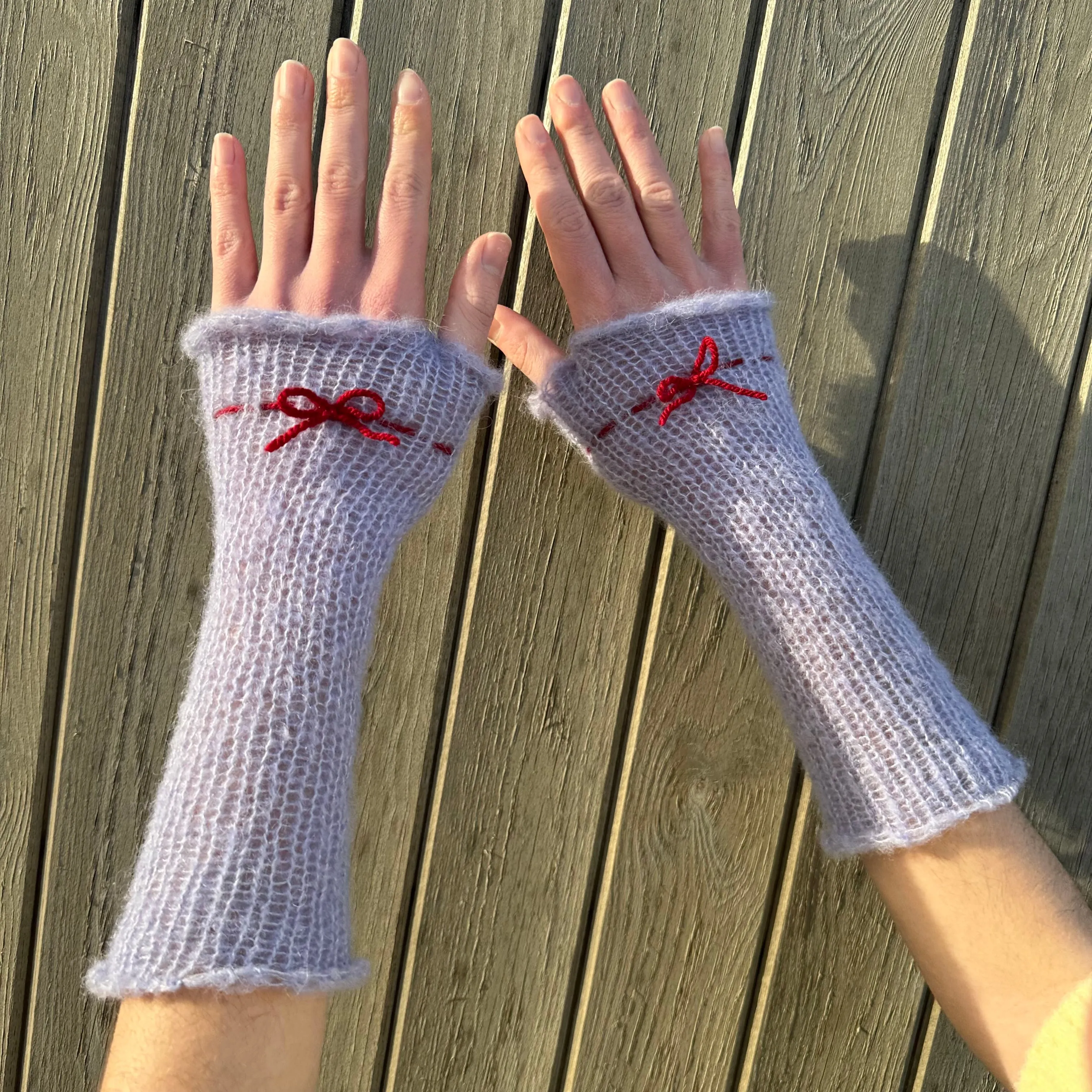 Handmade knitted mohair bow gloves in baby blue and red - with thumb hole