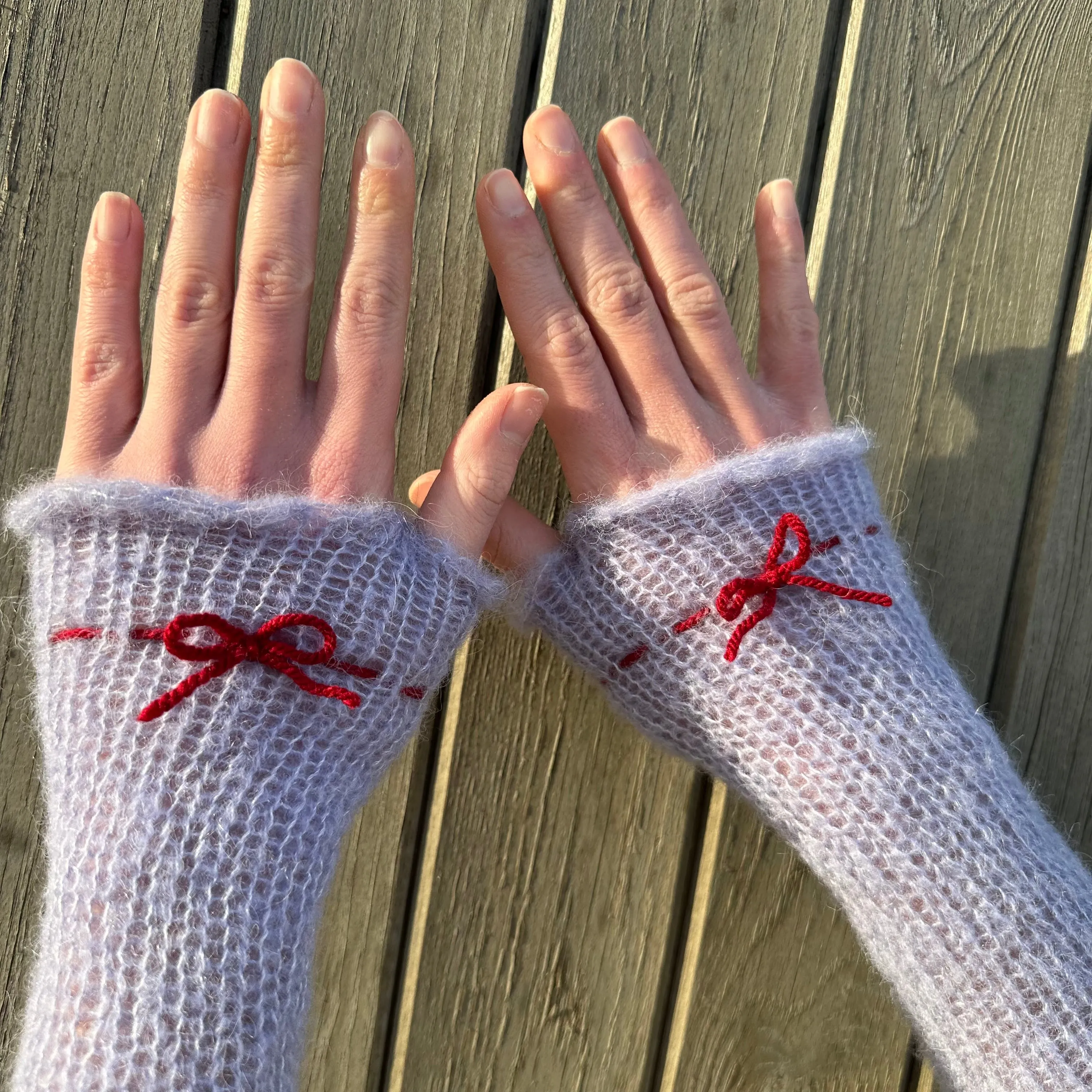 Handmade knitted mohair bow gloves in baby blue and red - with thumb hole